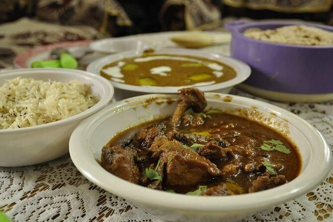 Veg and Non veg : Private Cooking Class in Delhi home (7 meal) - Entering a Delhi home kitchen, not a classroom